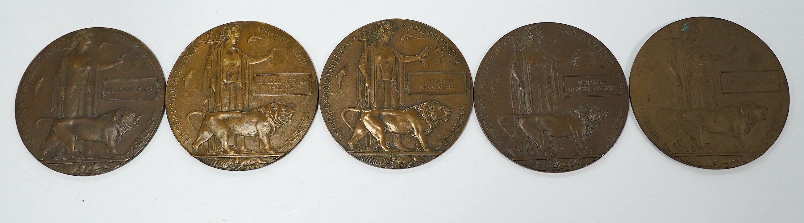 Five First World War Next of Kin Memorial plaques. Condition - fair to good